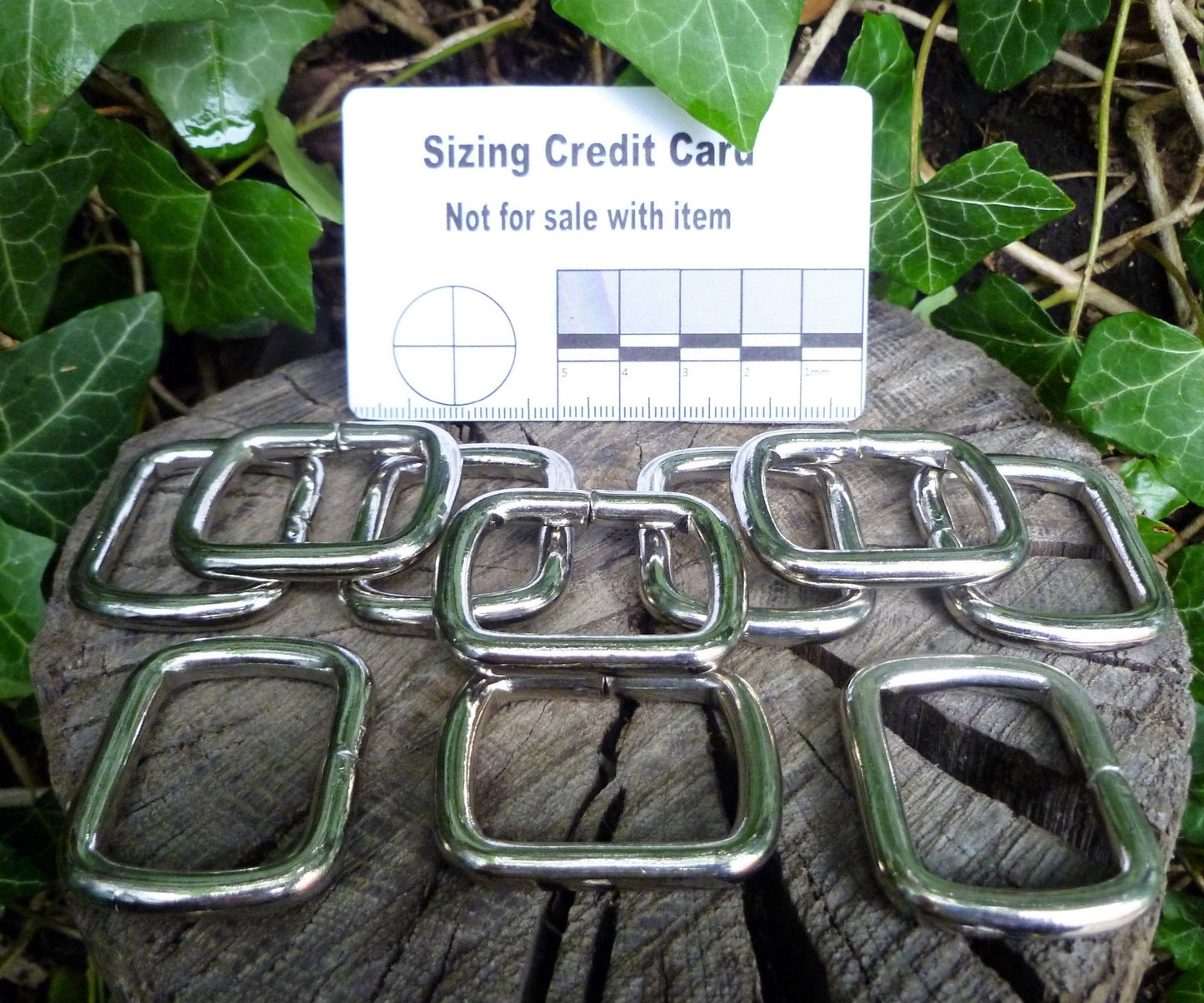 28mm (Internal) Nickel Square rings used as an attachment point for items such as small tools, flashlights, or other gear. Square ring Huggins Attic 10 - Rings   [Huggins attic]