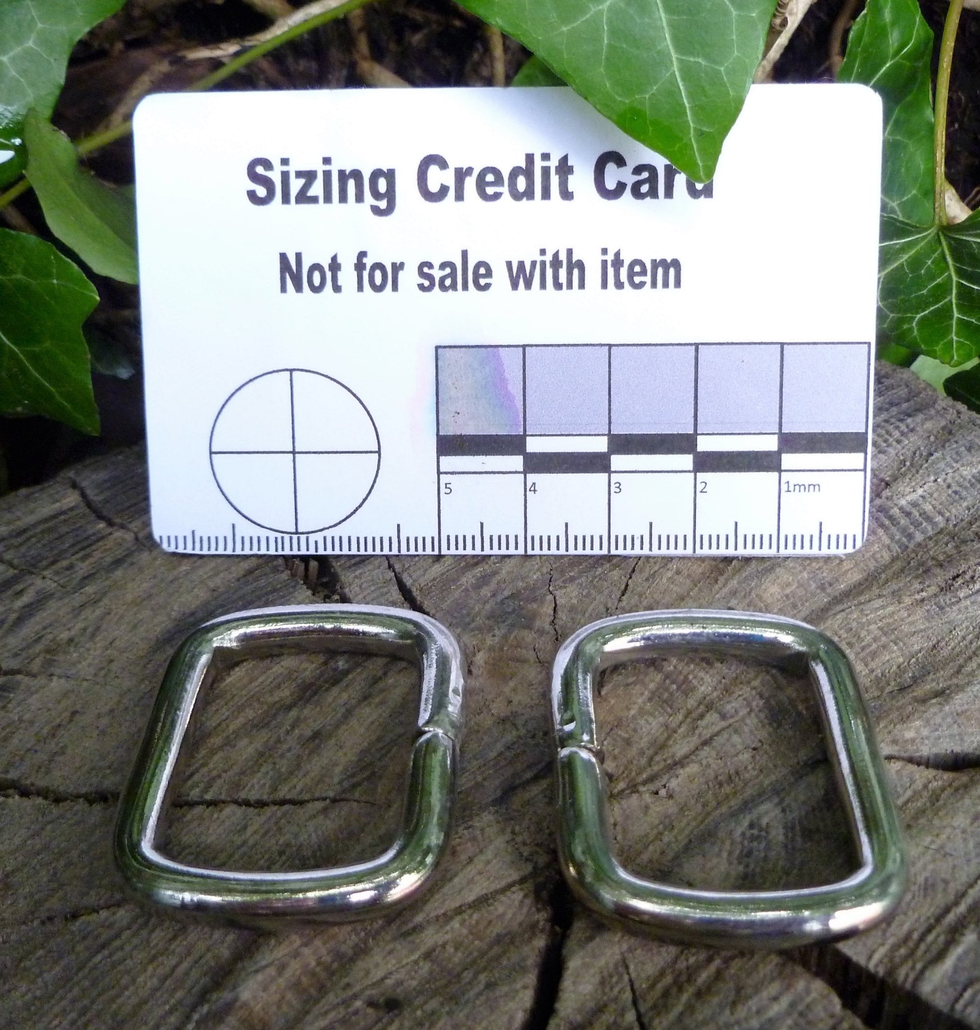 28mm (Internal) Nickel Square rings used as an attachment point for items such as small tools, flashlights, or other gear. Square ring Huggins Attic 2 - Rings   [Huggins attic]