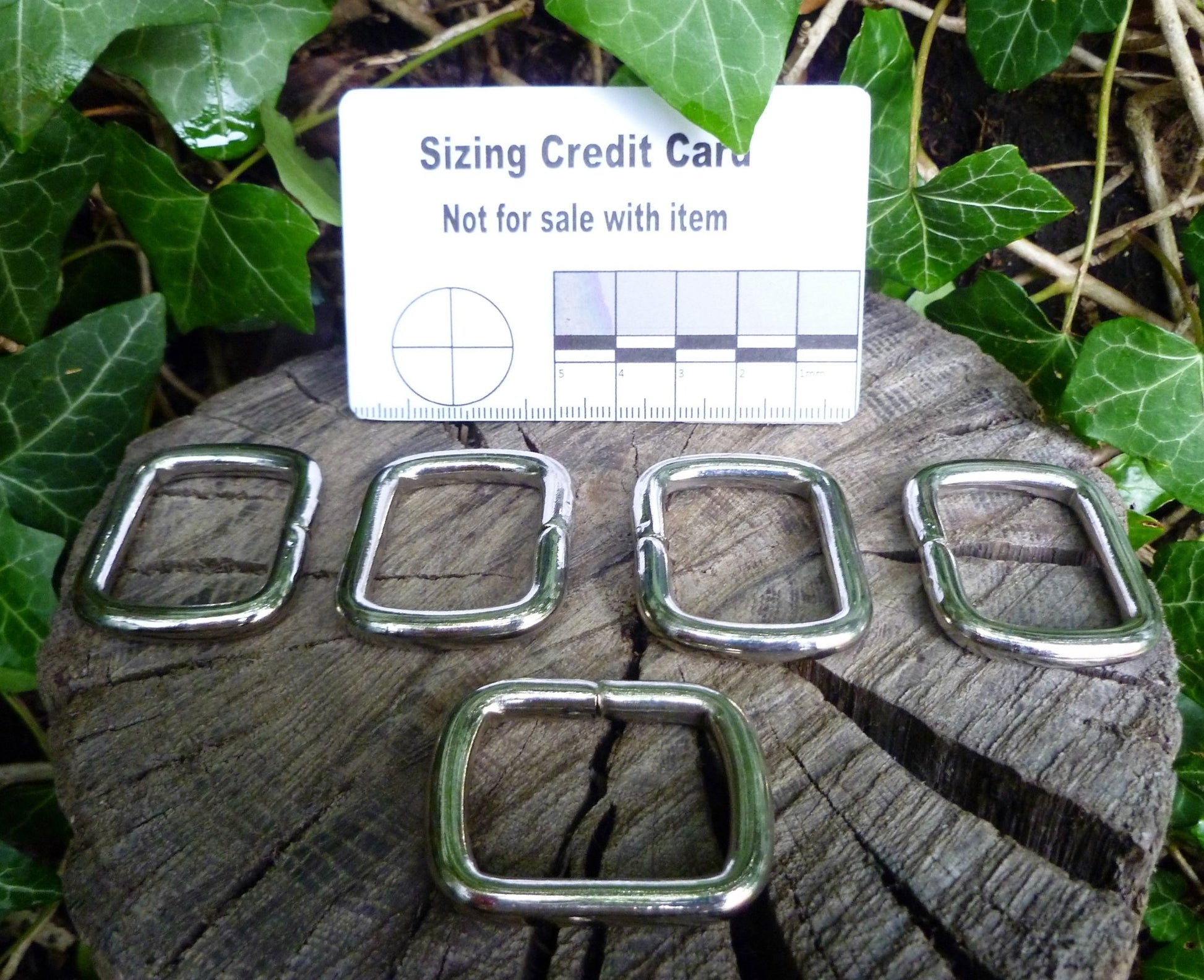 28mm (Internal) Nickel Square rings used as an attachment point for items such as small tools, flashlights, or other gear. Square ring Huggins Attic 5 - Rings   [Huggins attic]