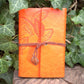 A6 ring binder Notebook with Leaf motif and paper held in clip binder loops  Hugginsattic Orange   [Huggins attic]