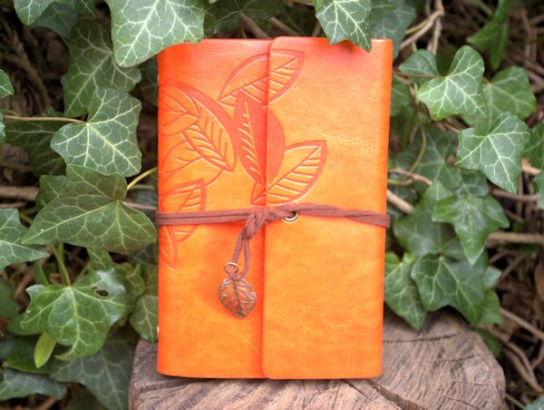 A6 ring binder Notebook with Leaf motif and paper held in clip binder loops  Hugginsattic Orange   [Huggins attic]
