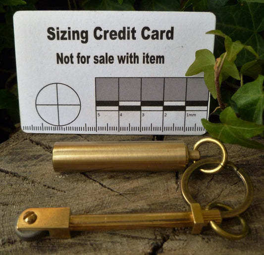 Brass Sparker, bronze split ring, 4 Flints, Cotton wool, & brass capsule Sparker kit Huggins Attic    [Huggins attic]