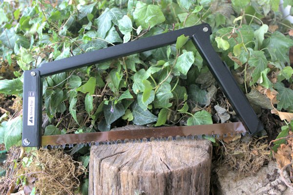 Folding hand saw in case designed for gardening Folding Saw Hugginsattic    [Huggins attic]