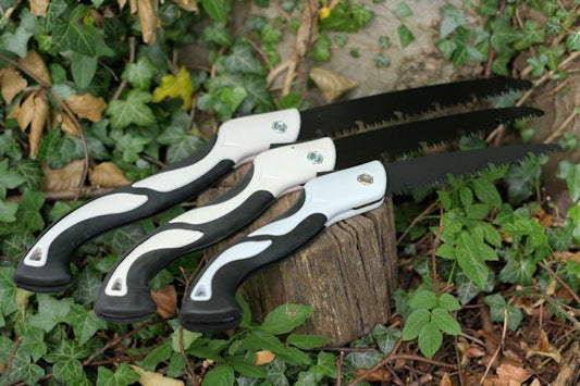 Folding pruning saws in three sizes small, medium and large Folding Saw Hugginsattic    [Huggins attic]