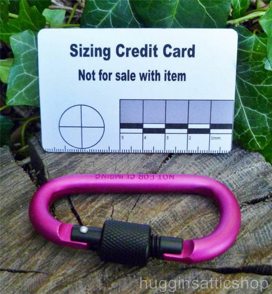 Pair of Pink Screw gate Carabiners. Great to attach to backpacks, bags, keyrings, kettles, tents, and ropes. NOT FOR CLIMBING or HEAVY WEIGHTS. Carabiner Huggins Attic    [Huggins attic]