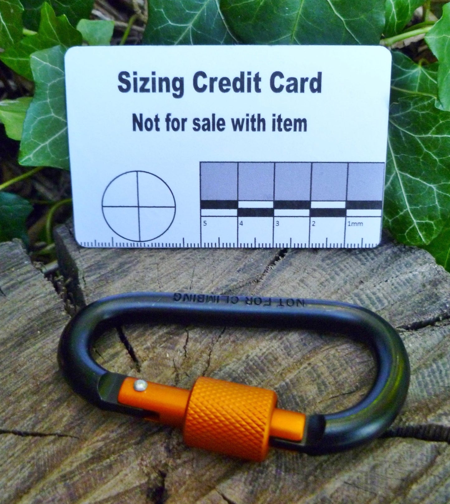 Pairs of Black/Orange Screw gate Carabiners. Great to attach to backpacks, bags, keyrings, kettles, tents, and ropes. NOT FOR CLIMBING or HEAVY WEIGHTS Carabiner Huggins Attic    [Huggins attic]