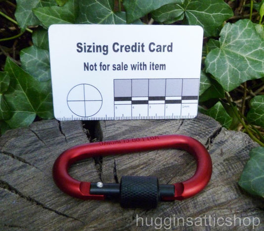 Pairs of Red Screw gate Carabiners. Great to attach to backpacks, bags, keyrings, kettles, tents, and ropes. NOT FOR CLIMBING or HEAVY WEIGHTS Carabiner Huggins Attic    [Huggins attic]