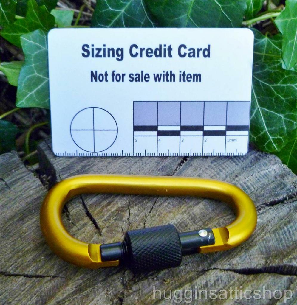 Pairs of Yellow Screw gate Carabiners. Great to attach to backpacks, bags, keyrings, kettles, tents, and ropes. NOT FOR CLIMBING or HEAVY WEIGHTS Carabiner Huggins Attic    [Huggins attic]